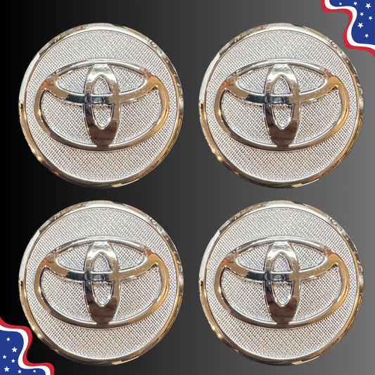 Set of four 57 mm Toyota-compatible silver wheel center caps, front view