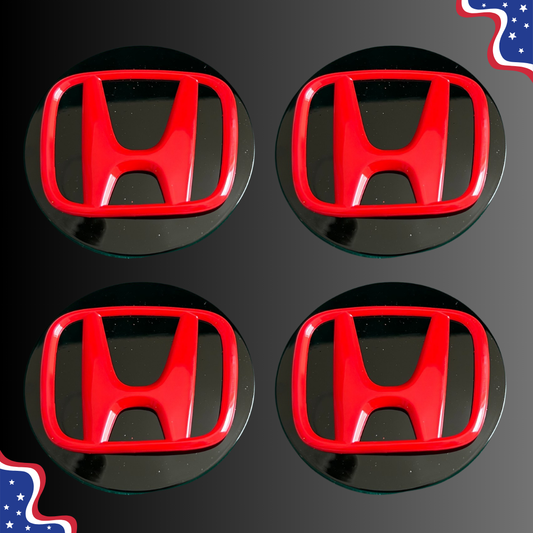 Set of four 69 mm Honda-compatible black and red wheel center caps, front view