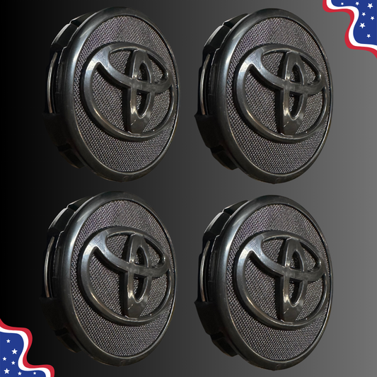 Set of four 57 mm Toyota-compatible black wheel center caps, side view